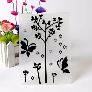 Embossing folder for fondant cake decoration featuring butterfly and tree vine designs