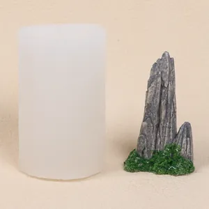 Comparison of white silicone mold and finished rockery mountain candle ornament.