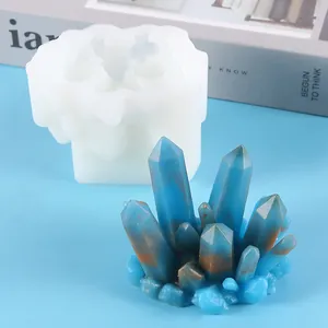 Detailed macro view of white silicone crystal cluster mold with blue resin sample