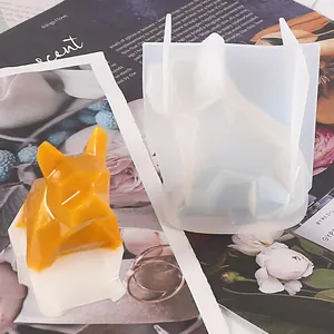 Detail view of 3D geometric French Bulldog silicone mold with yellow resin sample