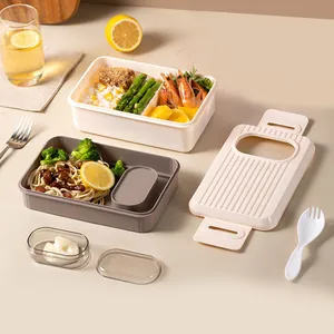 Detailed view of a modern double-layer bento box with separate compartments and a secure lid