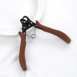 Macro view of professional jewelry 9-pin rolling pliers featuring ergonomic brown handles