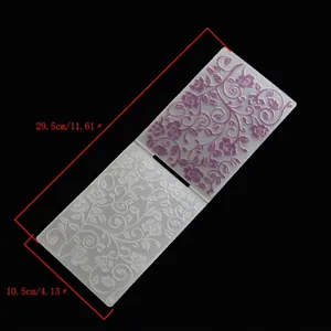 Detailed view of floral plastic embossing folder showing 29.5x10.5cm dimensions