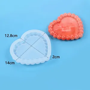 Detail view of heart-shaped silicone mold with 14x12.8cm dimensions for DIY resin tray.