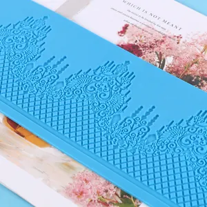 Macro view of blue silicone lace border mold for fondant cake decorating