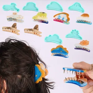 Detail view of various DIY silicone molds for resin hair clips and finished products