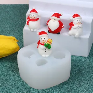 Detail of 4-hole silicone mold for DIY Christmas Santa and snowman candle ornaments