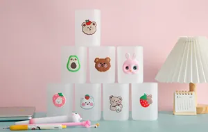 Stack of cute frosted cartoon pencil holders with silicone designs for desk organization
