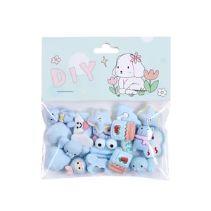 Set di ciondoli in resina a cartoni animati blu pastello per fai da te e cartoleria