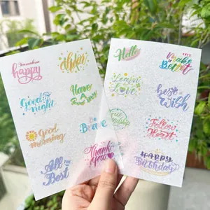 Nahaufnahme von transluzenten Washi-Papier-Aufklebern mit bunten englischen Kalligrafien