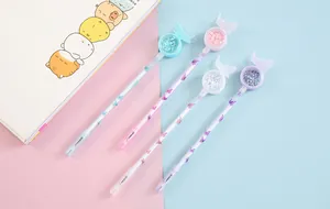 Detailed view of cute pastel gel pens with butterfly wing tops and glitter sequins inside.