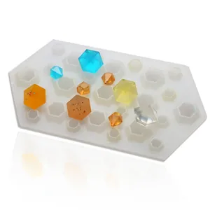 Detailed macro view of the silicone diamond mold including colored resin casting results
