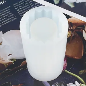 Detailed view of a white silicone vase mold with a wavy interior pattern for resin DIY
