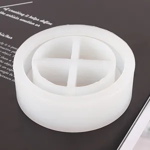 Macro view of a circular silicone mold with a four-compartment cross divider for resin DIY