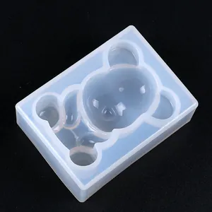 Detailed view of a translucent silicone bear-shaped mold for fondant and resin DIY crafts