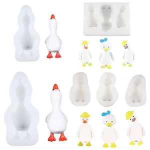 Detailansicht mehrerer süßer Cartoon-Ente Silikonformen mit fertigen Figuren