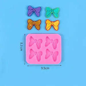 Detalle de molde de silicona para fondant con forma de lazo, medidas y peso de 65g