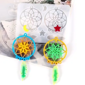 Macro view of DIY resin dreamcatcher silicone mold and vibrant finished jewelry pieces