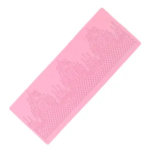 Detailed macro view of an intricate pink silicone lace fondant cake border mold