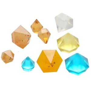 Detailed view of colorful multi-faceted irregular crystal resin diamonds