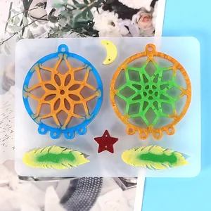 Detailed view of DIY dreamcatcher silicone resin mold with vibrant finished pieces