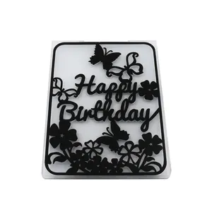Macro view of a Happy Birthday embossing folder with butterfly and flower design elements