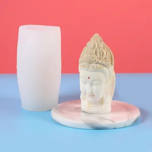 Vue détaillée du moule en silicone tête de Bouddha et sculpture de cire d'aromathérapie.