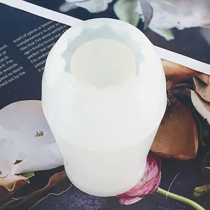 Detail view of translucent silicone vase mold with decorative scalloped rim