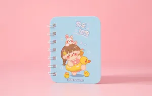 Cute mini blue pocket spiral notebook featuring a cartoon girl illustration and Zizi Sauce branding