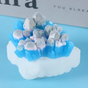 Detailed view of DIY translucent silicone mold featuring blue resin crystal cluster