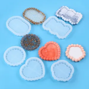 Set of DIY silicone molds for resin casting heart and cloud shaped jewelry trays