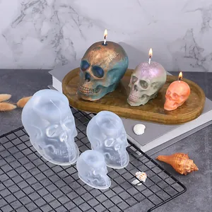 Set of three different sized skull silicone molds for Halloween DIY candle making and resin art