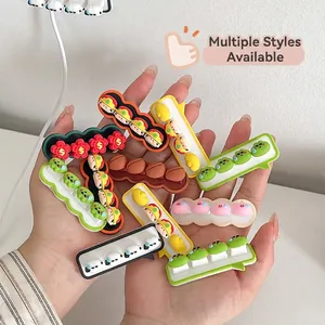 Colorful cartoon cable organizers in various cute shapes for desk management
