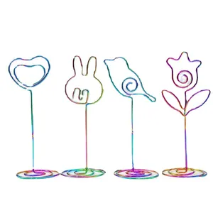 Set of 4 iridescent metal memo clips in heart bunny bird and flower shapes