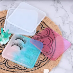 Detailed view of DIY silicone eyelash storage mold and finished gradient resin tray