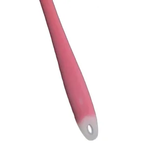 Detailed macro view of a pink and white silicone spatula handle with a functional hanging hole.