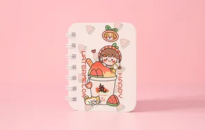 Detailed view of a cute cartoon spiral notebook featuring a watermelon girl illustration.