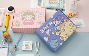 Close-up detail of cute cartoon stationery gift boxes in pink and purple colors