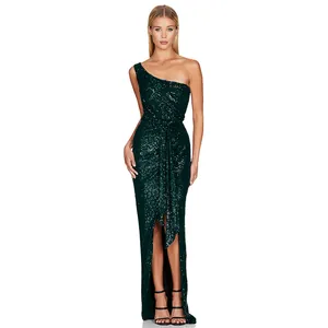 Elegant emerald green one-shoulder sequin gown with a side slit for formal events