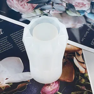 Close-up of geometric faceted silicone mold for DIY crystal resin vase casting.