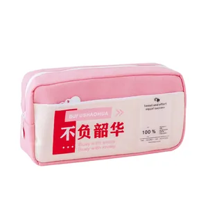 Estuche de lona rosa de gran capacidad con cremalleras dobles y texto inspirador