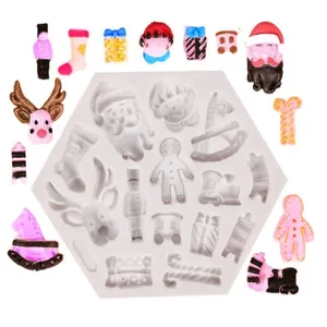 Detailed view of Christmas silicone mold featuring Santa and gingerbread man shapes