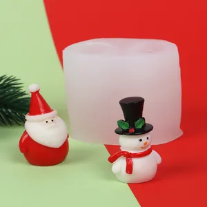 Silicone mold for DIY Christmas candle making featuring Santa and snowman figurines