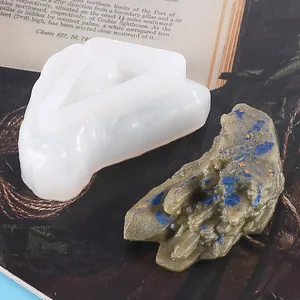 Detailed macro view of white silicone mold for DIY crystal cluster resin stone ornaments.