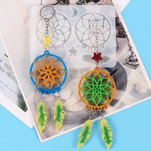 DIY dreamcatcher resin mold kit with finished colorful feather keychains in silicone