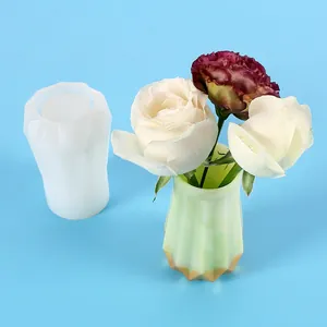 Detail showing silicone vase mold and finished resin flower vase with roses