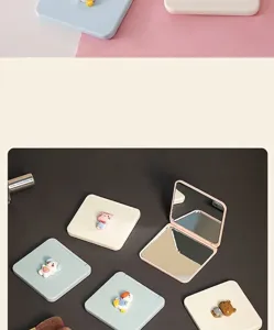 Detailed view of portable foldable mini cartoon makeup mirror with double-sided design