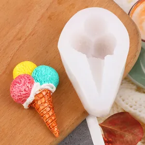 Close-up of high-quality ice cream cone silicone mold with colorful resin model on wood