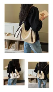Three views of a large cream hobo shoulder bag with brown straps and zipper details.