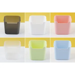Multi-color collection of plastic desktop storage boxes for stationery and cosmetics